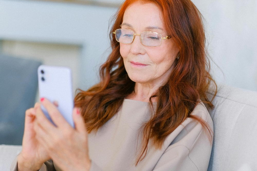 older woman using phone